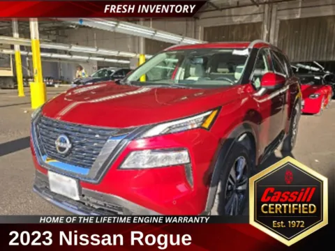 Red 2023 Nissan Rogue SL for sale in Cedar Rapids, IA