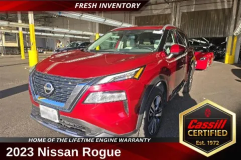Red 2023 Nissan Rogue SL for sale in Cedar Rapids, IA