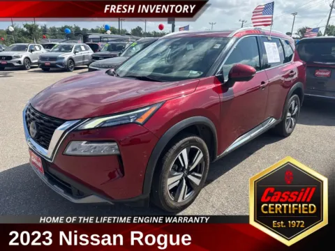 Red 2023 Nissan Rogue SL for sale in Cedar Rapids, IA