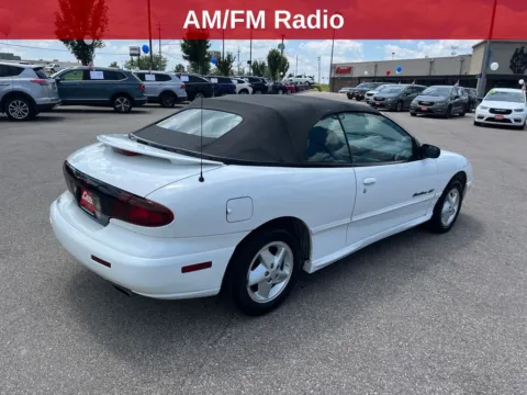 More photos of 1999 Pontiac Sunfire GT at Cassill Motors, IA