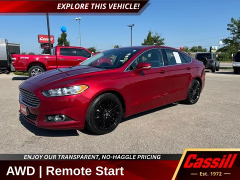 Red 2016 Ford Fusion SE for sale in Cedar Rapids, IA