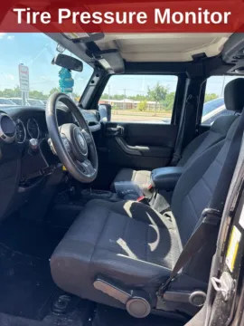 Another view of 2011 Jeep Wrangler Unlimited Sport for sale in Cedar Rapids, IA at Cassill Motors