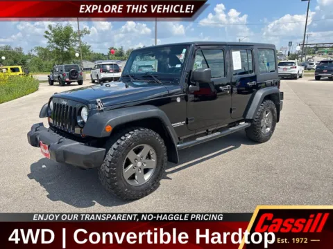 Black 2011 Jeep Wrangler Unlimited Sport for sale in Cedar Rapids, IA