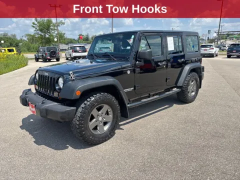 Photos of 2011 Jeep Wrangler Unlimited Sport for sale in Cedar Rapids, IA at Cassill Motors