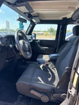 Photos of 2011 Jeep Wrangler Unlimited Sport for sale in Cedar Rapids, IA at Cassill Motors