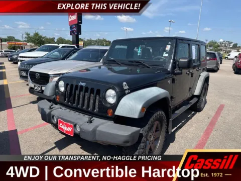 Black 2011 Jeep Wrangler Unlimited Sport for sale in Cedar Rapids, IA