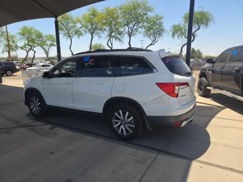 Photos of 2021 Honda Pilot EX for sale in Cedar Rapids, IA at Cassill Motors