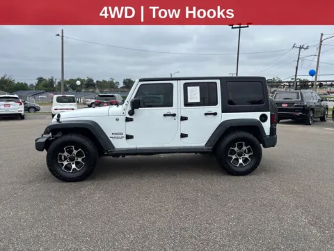 Photos of 2015 Jeep Wrangler Unlimited Sport for sale in Cedar Rapids, IA at Cassill Motors