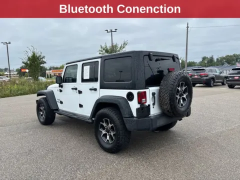 Another view of 2015 Jeep Wrangler Unlimited Sport for sale in Cedar Rapids, IA at Cassill Motors