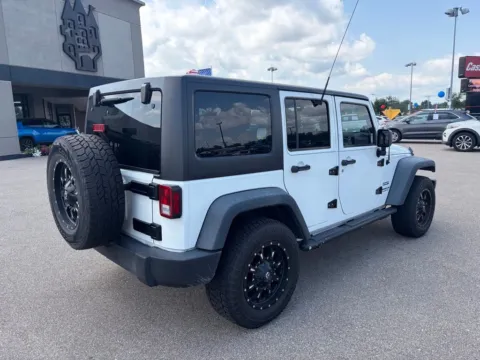 More photos of 2015 Jeep Wrangler Unlimited Sport at Cassill Motors, IA