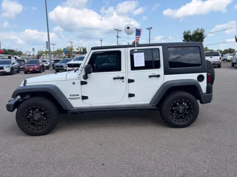 Photos of 2015 Jeep Wrangler Unlimited Sport for sale in Cedar Rapids, IA at Cassill Motors