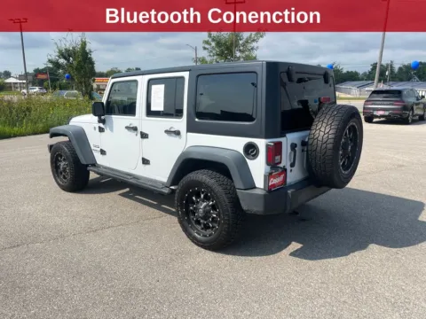 Another view of 2015 Jeep Wrangler Unlimited Sport for sale in Cedar Rapids, IA at Cassill Motors