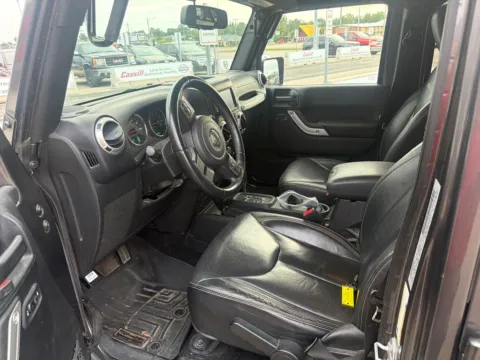 Photos of 2017 Jeep Wrangler Unlimited Sahara for sale in Cedar Rapids, IA at Cassill Motors