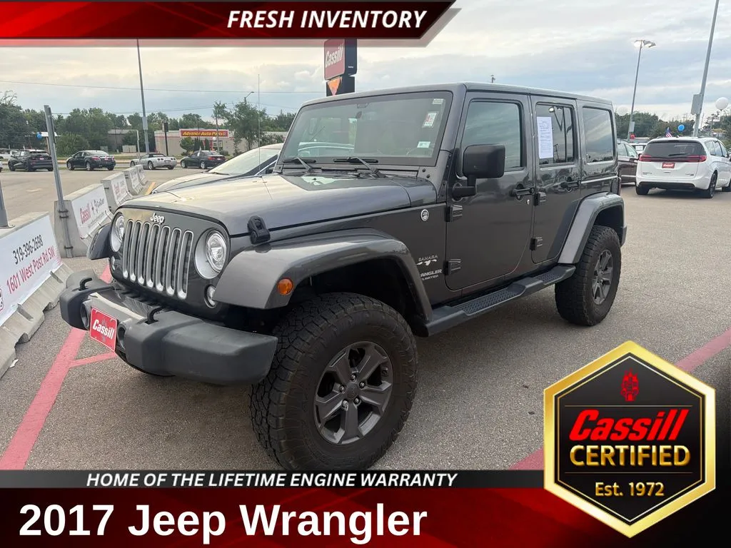 Gray 2017 Jeep Wrangler Unlimited Sahara for sale in Cedar Rapids, IA