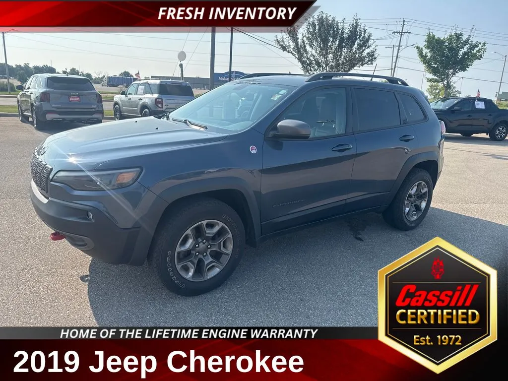 Blue 2019 Jeep Cherokee Trailhawk for sale in Cedar Rapids, IA
