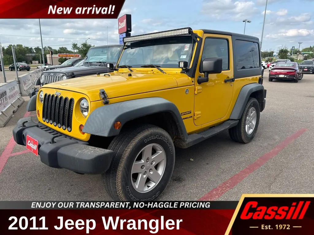 Yellow 2011 Jeep Wrangler Sport for sale in Cedar Rapids, IA