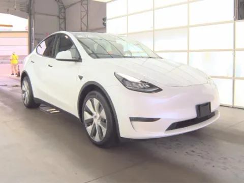 More photos of 2023 Tesla Model Y Long Range at Cassill Motors, IA
