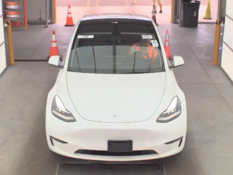 More photos of 2023 Tesla Model Y Long Range at Cassill Motors, IA