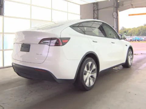 More photos of 2023 Tesla Model Y Long Range at Cassill Motors, IA
