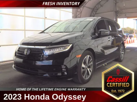 Black 2023 Honda Odyssey Touring for sale in Cedar Rapids, IA