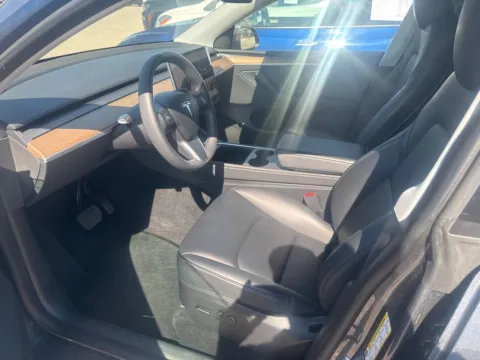 Photos of 2023 Tesla Model Y Long Range for sale in Cedar Rapids, IA at Cassill Motors