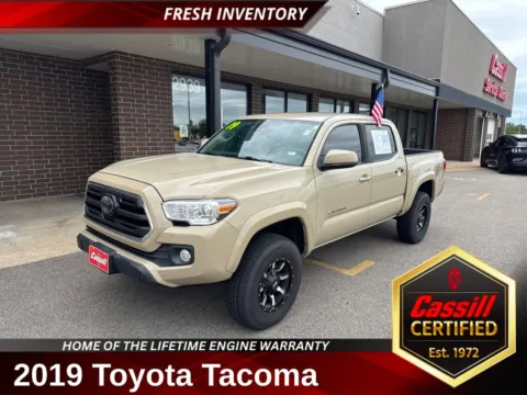 Beige 2019 Toyota Tacoma SR5 for sale in Cedar Rapids, IA