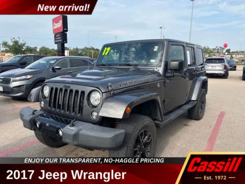 Gray 2017 Jeep Wrangler Unlimited Sahara for sale in Cedar Rapids, IA