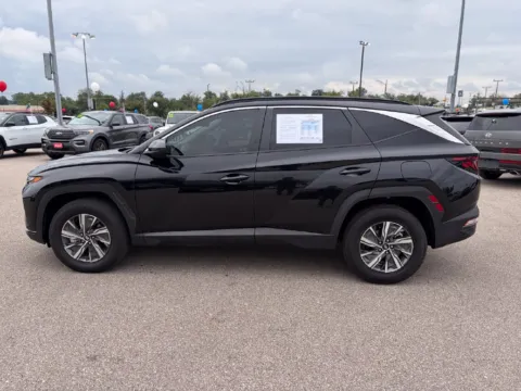 Photos of 2024 Hyundai Tucson Hybrid Blue for sale in Cedar Rapids, IA at Cassill Motors