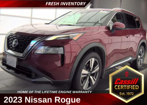 Red 2023 Nissan Rogue SL for sale in Cedar Rapids, IA