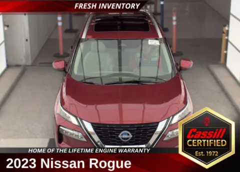 Red 2023 Nissan Rogue SL for sale in Cedar Rapids, IA