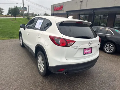 Photos of 2015 Mazda CX-5 Sport for sale in Cedar Rapids, IA at Cassill Motors