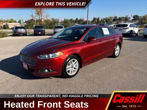 Orange 2014 Ford Fusion SE for sale in Cedar Rapids, IA