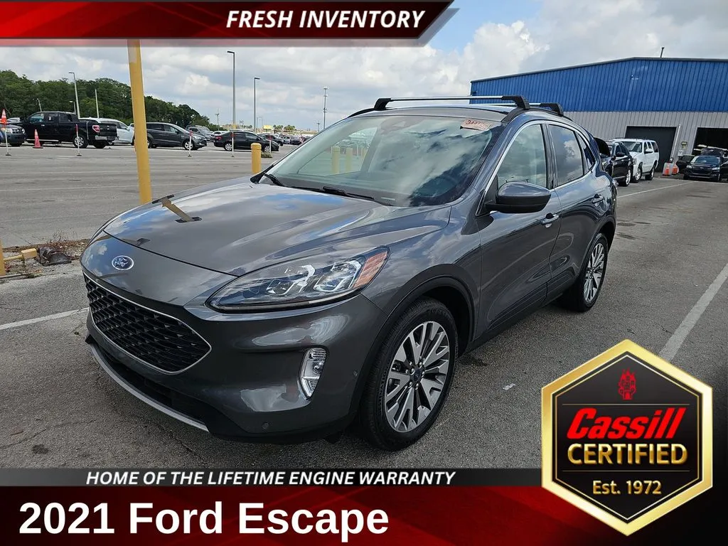 Gray 2021 Ford Escape Hybrid Titanium for sale in Cedar Rapids, IA