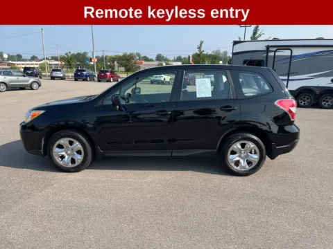 Photos of 2014 Subaru Forester 2.5i for sale in Cedar Rapids, IA at Cassill Motors