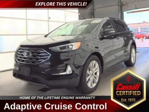 Black 2022 Ford Edge Titanium for sale in Cedar Rapids, IA