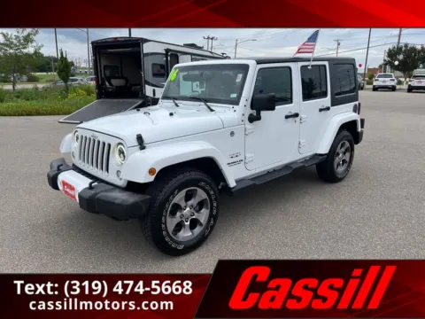 White 2016 Jeep Wrangler Unlimited Sahara for sale in Cedar Rapids, IA