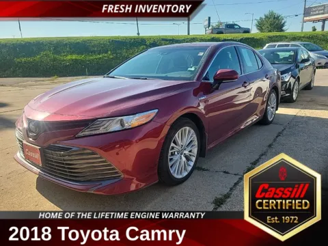 Red 2018 Toyota Camry Hybrid LE for sale in Cedar Rapids, IA