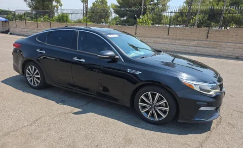 Photos of 2019 Kia Optima EX for sale in Cedar Rapids, IA at Cassill Motors
