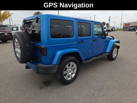 More photos of 2016 Jeep Wrangler Unlimited Sahara at Cassill Motors, IA
