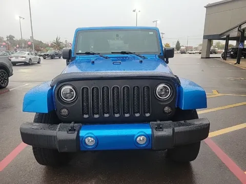 Photos of 2016 Jeep Wrangler Unlimited Sahara for sale in Cedar Rapids, IA at Cassill Motors