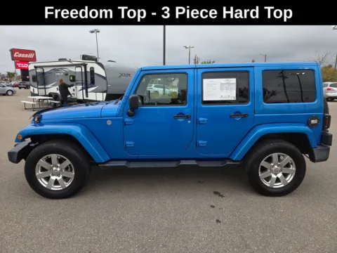 Photos of 2016 Jeep Wrangler Unlimited Sahara for sale in Cedar Rapids, IA at Cassill Motors