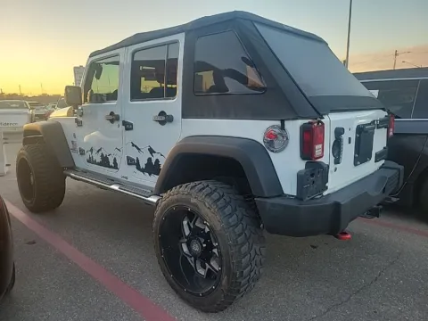 More photos of 2013 Jeep Wrangler Unlimited Sport at Cassill Motors, IA