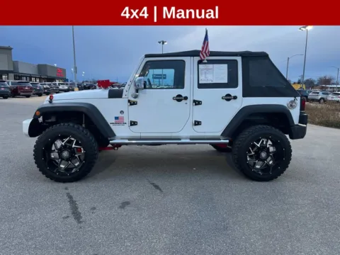 Photos of 2013 Jeep Wrangler Unlimited Sport for sale in Cedar Rapids, IA at Cassill Motors