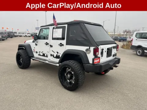 Another view of 2013 Jeep Wrangler Unlimited Sport for sale in Cedar Rapids, IA at Cassill Motors