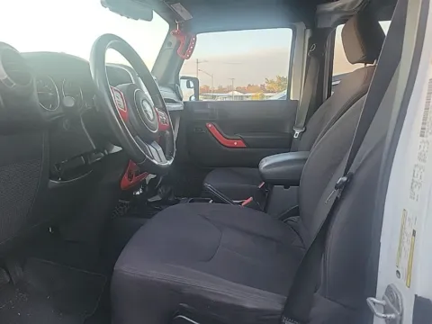 More photos of 2013 Jeep Wrangler Unlimited Sport at Cassill Motors, IA