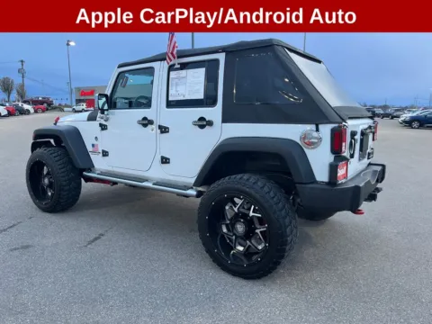 Another view of 2013 Jeep Wrangler Unlimited Sport for sale in Cedar Rapids, IA at Cassill Motors
