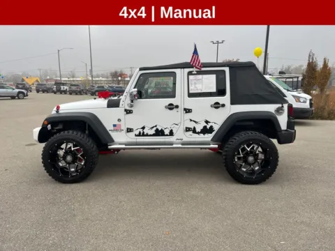 Photos of 2013 Jeep Wrangler Unlimited Sport for sale in Cedar Rapids, IA at Cassill Motors