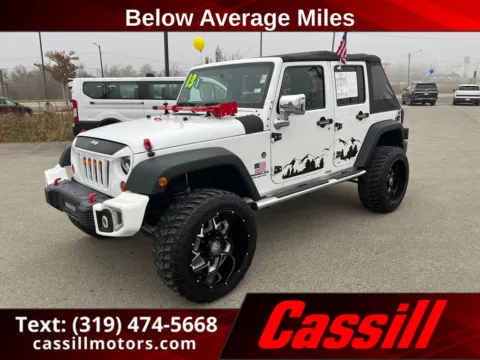 White 2013 Jeep Wrangler Unlimited Sport for sale in Cedar Rapids, IA