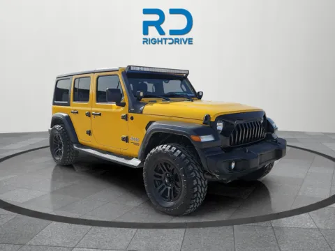 Yellow 2018 Jeep Wrangler Unlimited Sport S for sale in El Paso, TX