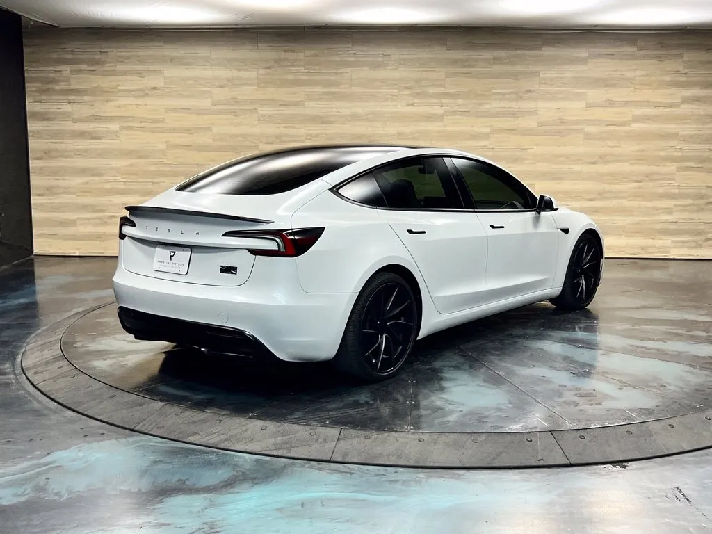 Tesla Model 3 photo 14
